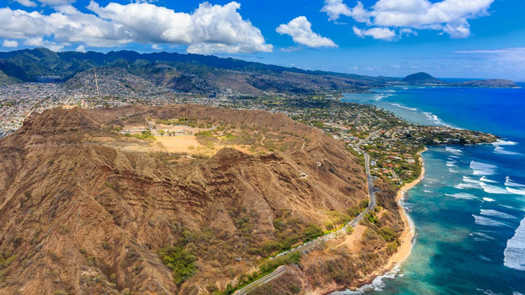 Aerial view of Diamond Head volcano crater on the island of Oahu, in Honolulu Hawaii, from a helicopter