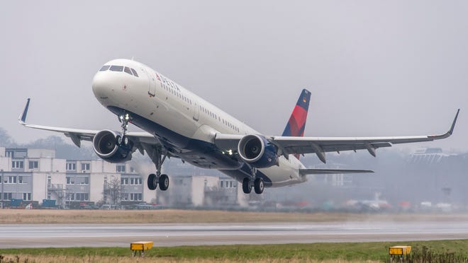 A Delta jet landing. Delta Air Lines