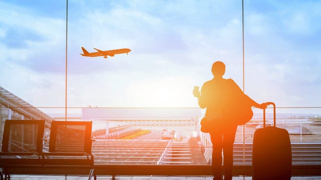 MotleyFool-TMOT-efa16865-travel-airport-scene