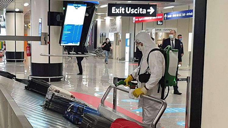 Sanitization operations take place at Fiumicino airport, near Rome, Italy, on the second day of the reopening of inter-regional travel on June 4, 2020. 