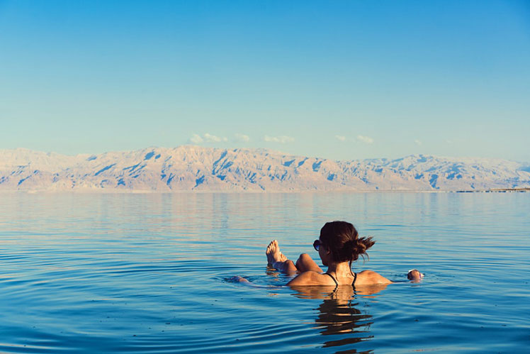 Visitors can check out the stillness of the Dead Sea © Hrecheniuk Oleksii/Shutterstock