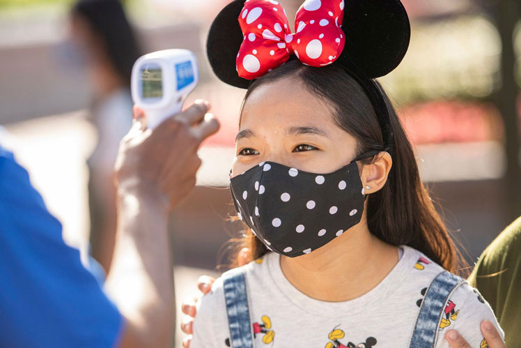 Walt Disney World will phase out temperature screenings for workers and theme park visitors later this month. WALT DISNEY WORLD RESORT VIA GETTY IMAGES