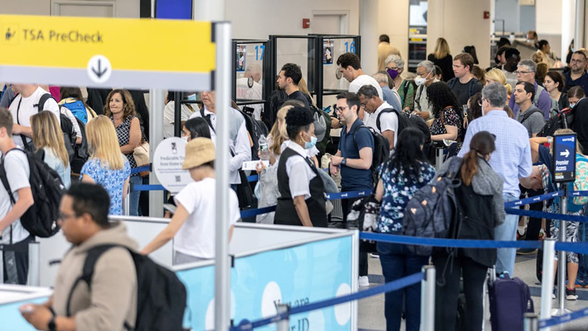 Travelers line up to enter a security checkpoint at Newark Liberty International Airport on July 1, 2022 in Newark, New Jersey. (Jeenah Moon/Getty Images)