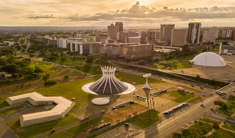 November, 20, 2017: Aerial of a cathedral and museum buildings in Brasilia during sunset.©061 Filmes/Shutterstock