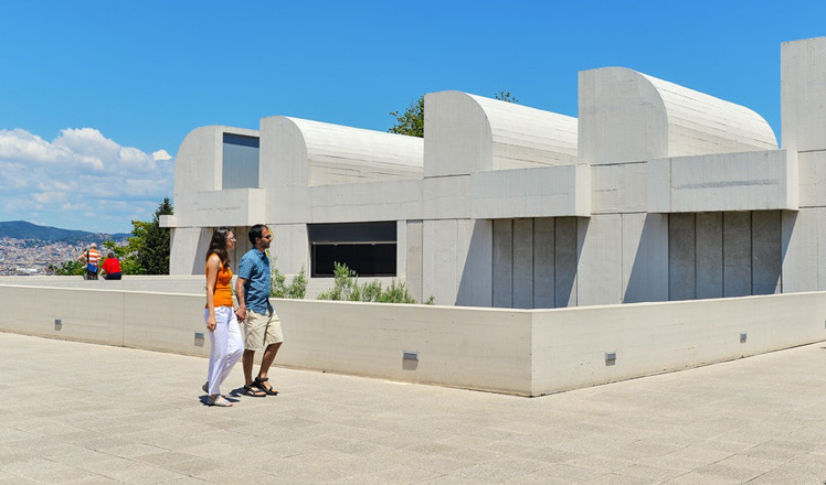 BARCELONA, SPAIN - JUNE1, 2014: Tourists walking in the terrace of Joan Miro Foundation. A museum of modern art honoring Joan Miro located on the hill called Montjuic. Architect: Josep Lluis Sert.©pio3/Shutterstock