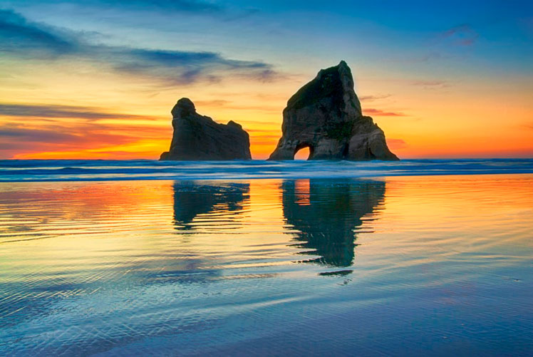 Wharariki Beach isn't great for swimming, but perfect for a peaceful walk on the shore ©7Michael/Getty Images
