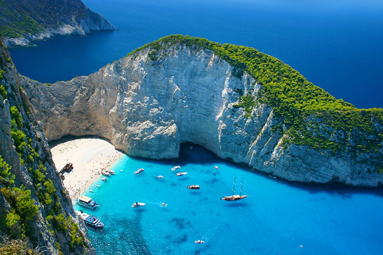 With its white cliffs, golden sand and iconic shipwreck, Navagio Beach is a real stunner © Petr Kopka / Shutterstock
