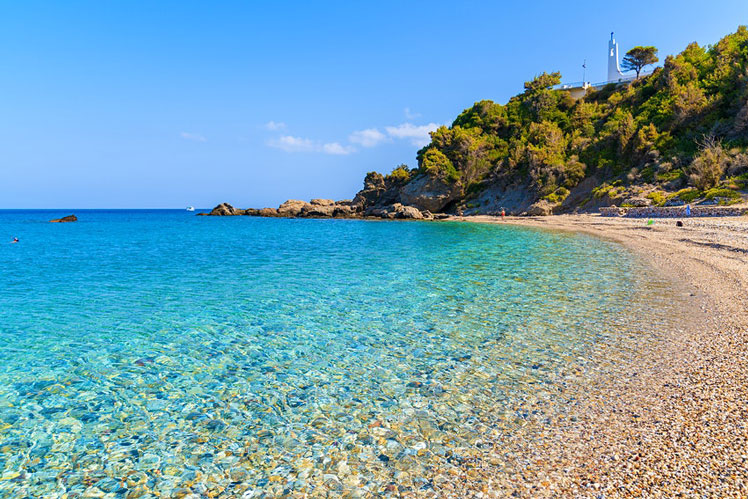 Potami Beach is perfect for those who love clear waters, quiet sands and great beach bars © pkazmierczak / Getty Images