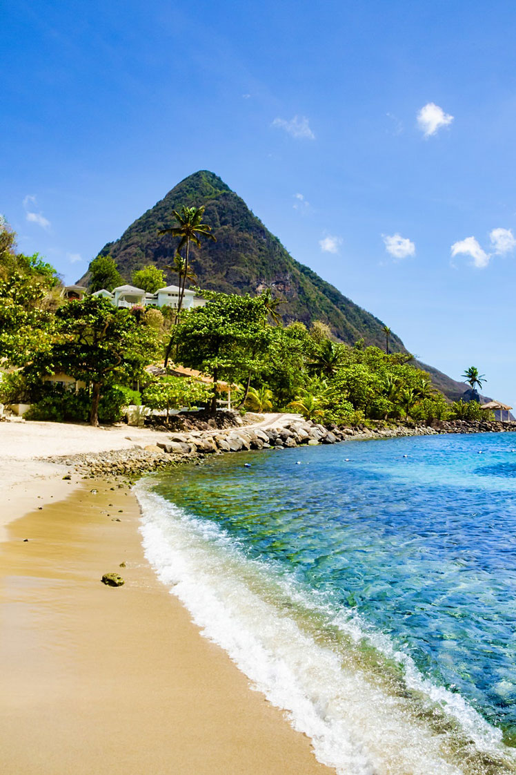 Sugar Beach in St Lucia is situated between the Pitons mountains © Jason Ondreicka / Getty Images / iStockphoto