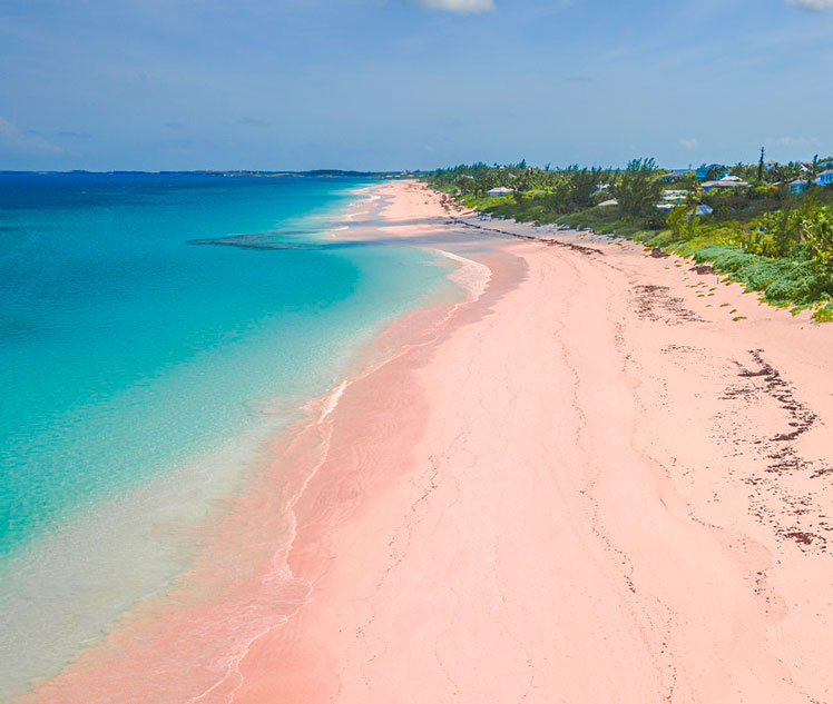 Pink Sand Beach is striking at first glance © Sky High Studios / Getty Images / RooM RF