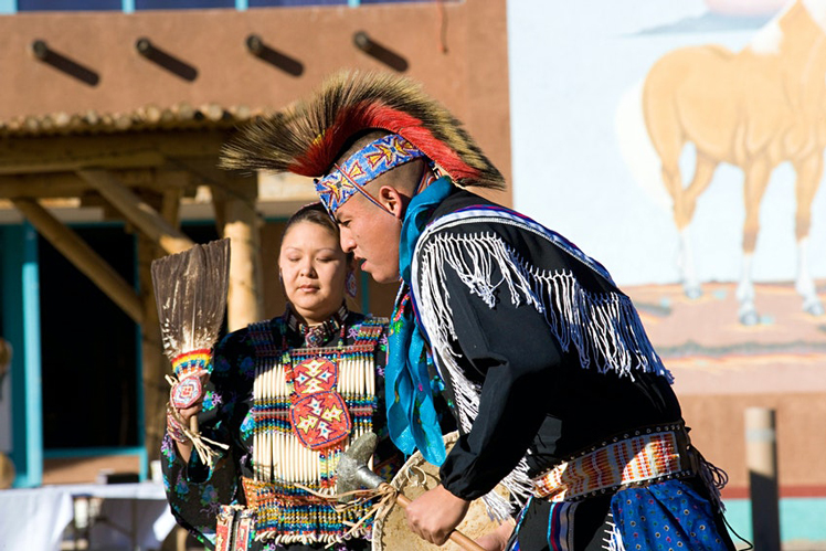 Indigenous dancers perform the Horse Dance at the Indian Pueblo Cultural Center © Alamy Stock Photo
