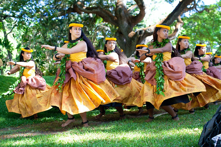 The Halau Na Mamo O Puuanahulu dance troupe performs at the Honolulu Hula Festival, summer of 2013 Honolulu Hawaii. Alamy Stock Photo
